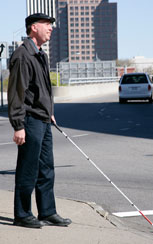 Photo of blind person with cane